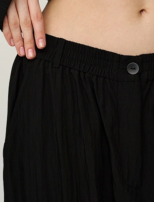 Черные женские брюки с вырезом ниже колена  Hass